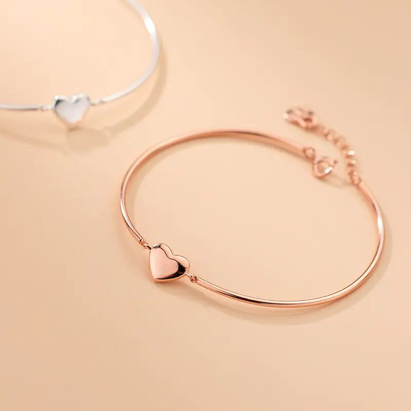 Glossy Silver Bracelet with Simple Sweet Design - Image 2
