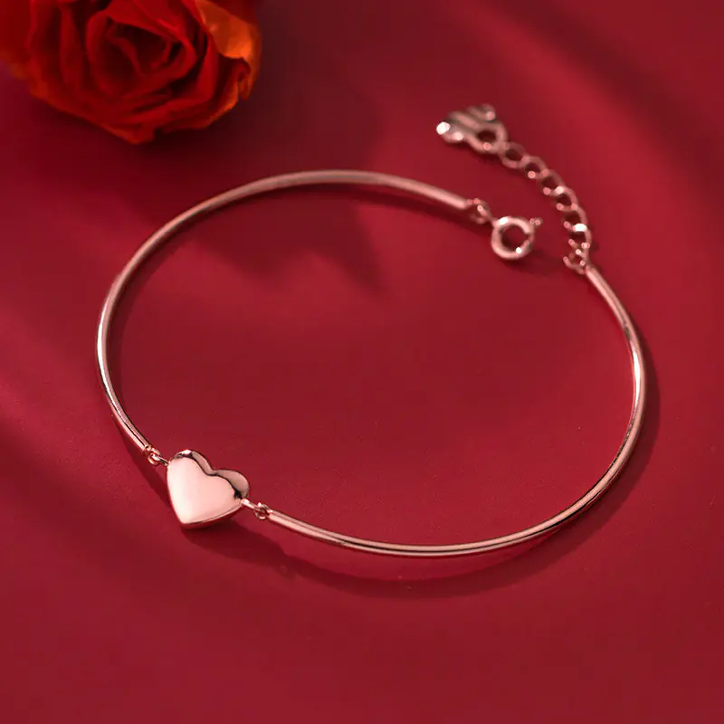 Glossy Silver Bracelet with Simple Sweet Design - Image 3